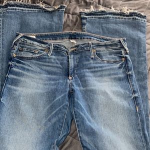 True Religion Flare Bottom Raw Edge Hem jeans